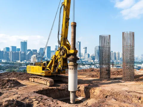 Foundation piling with rotary drilling rig