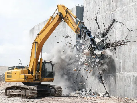 Hydraulic breaker on demolition excavator